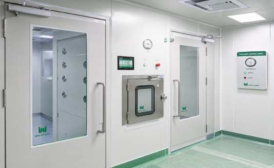 Cleanroom doors interlocks coordinated with air shower pass box and HVAC pressure control for ISO GMP project planning